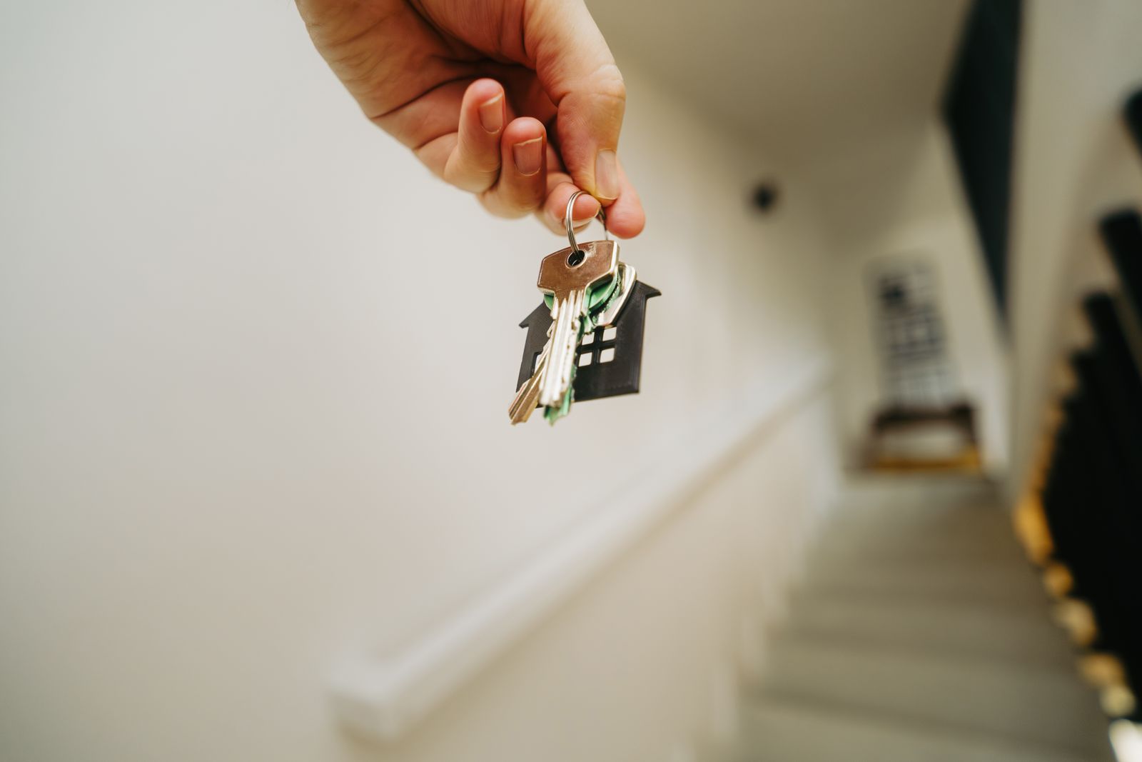 New homeowner unlocking their front door